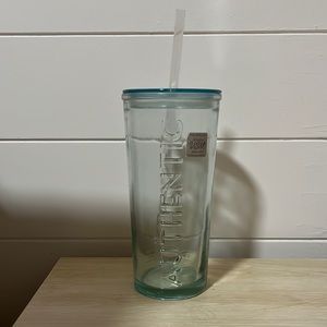 Glass drinking cup with straw